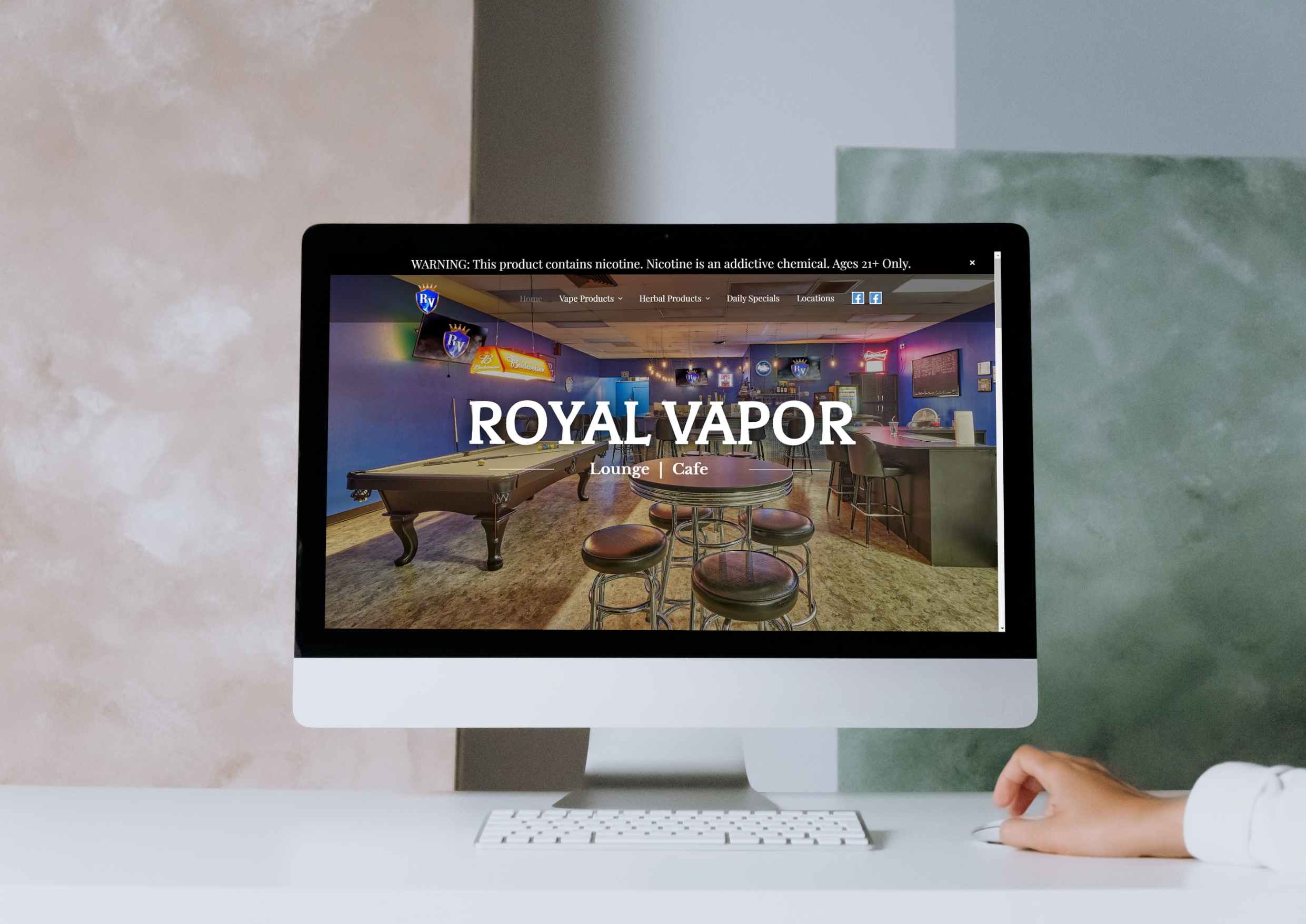 Royal Vapor's Lounges website on laptop for smoke shop web design portfolio